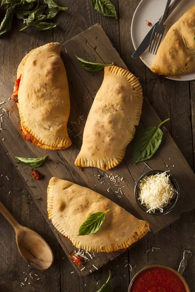 Homemade Italian Meat and Cheese Calzones — Stock Photo, Image