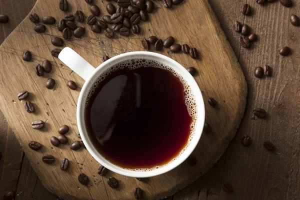 Tmavé organické černá káva — Stock fotografie