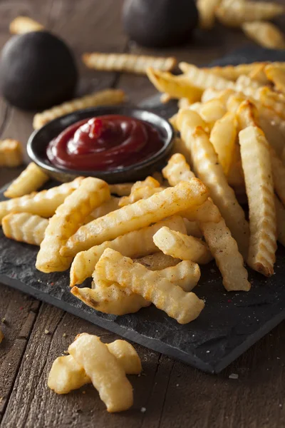 Unhealthy Baked Crinkle French Fries — Stock Photo, Image