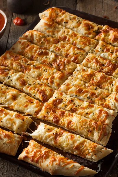 Homemade Cheesy Breadsticks with Marinara — Stock Photo, Image