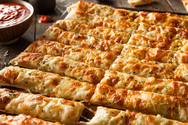 Homemade Cheesy Breadsticks with Marinara — Stock Photo, Image