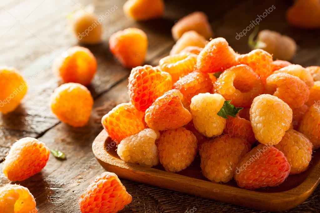 Raw Organic Orange Sunshine Raspberries Stock Photo by ©bhofack2 75238907