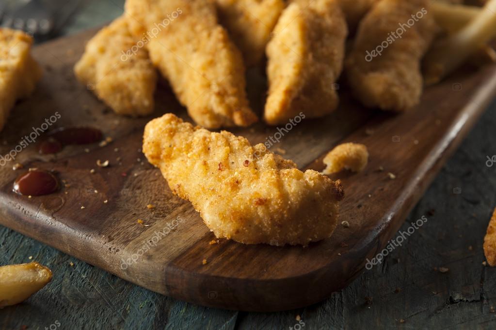 Homemade Breaded Chicken Tenders — Stock Photo © bhofack2 78222894