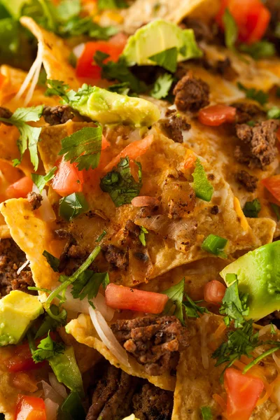 Carne de bovino e queijo carregados Nachos — Fotografia de Stock