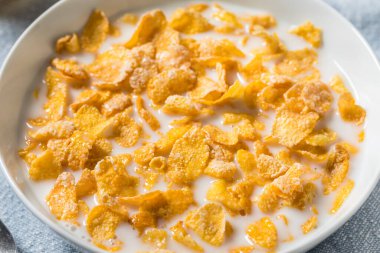 Healthy Frosted Corn Flake Breakfast Cereal with Whole Milk