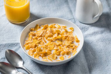 Healthy Frosted Corn Flake Breakfast Cereal with Whole Milk