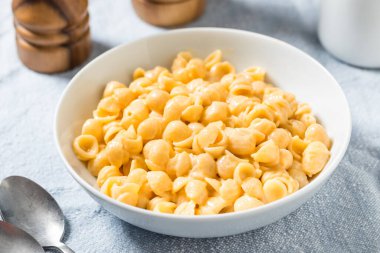 Homemade Healthy Macaroni and Cheese Shells with Cheddar in a Bowl