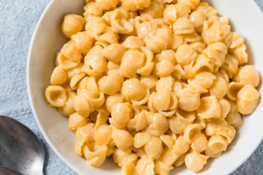 Homemade Healthy Macaroni and Cheese Shells with Cheddar in a Bowl