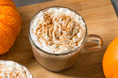 Sweet Homemade Warm Pumpkin Spice Latte with Whipped Cream