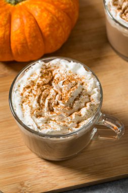 Sweet Homemade Warm Pumpkin Spice Latte with Whipped Cream