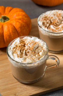 Sweet Homemade Warm Pumpkin Spice Latte with Whipped Cream
