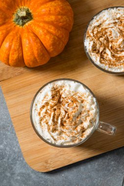 Sweet Homemade Warm Pumpkin Spice Latte with Whipped Cream