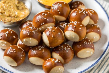 Salty Homemade Soft Pretzel Bites with Mustard and Cheese