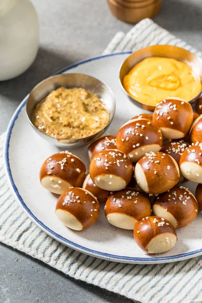 Salty Homemade Soft Pretzel Bites with Mustard and Cheese