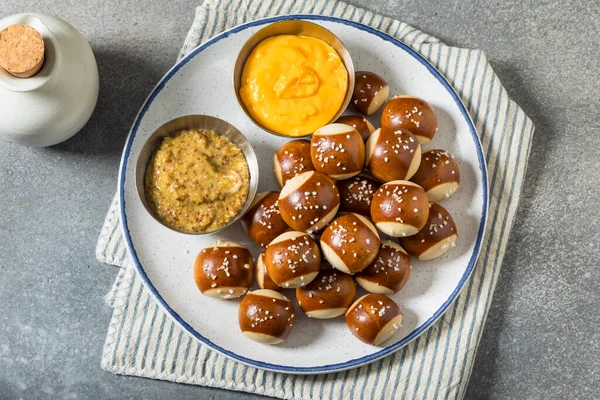 Salty Homemade Soft Pretzel Bites with Mustard and Cheese