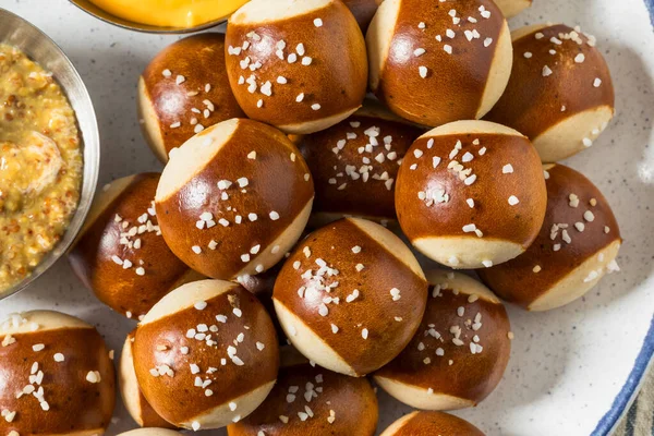 Salty Homemade Soft Pretzel Bites with Mustard and Cheese