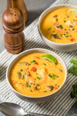 Homemade Spicy Thai Shrimp Soup with Cilantro and Lime