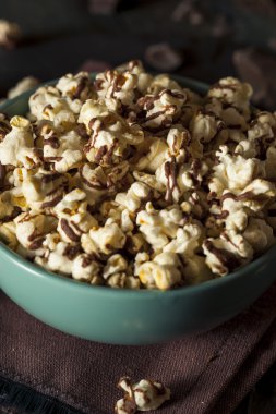Homemade Chocolate Drizzled Caramel Popcorn clipart