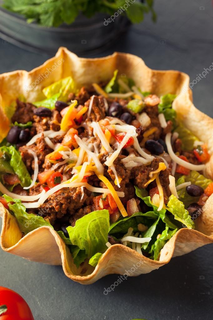 Taco Salad in a Tortilla Bowl — Stock Photo © bhofack2 98231540