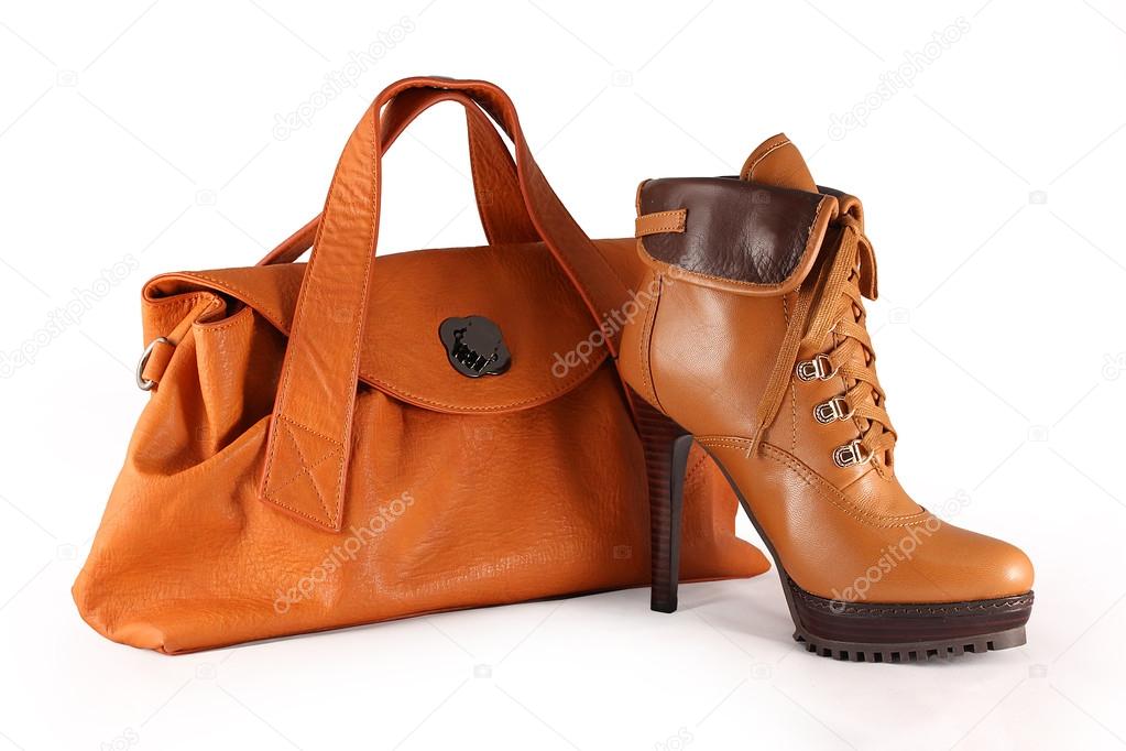 Ginger Footwear and accessories on white Stock Photo by ©MILADANY 60889253