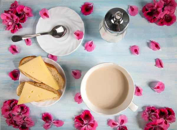 Coffee latte and cheese sandwiches.