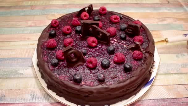 Taking Slice Chocolate Berry Pie Eating Cake Strawberries Blueberries Delicious — Stockvideo