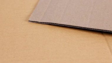 kıvrımlı karton doku, ambalaj endüstrisi için kahverengi karton kağıt, geri dönüşüm, lojistik, ihracat ithalat ve depo kullanımı, arka plan için kıvrımlı mukavva, kağıt atığı geri dönüşümü kavramı