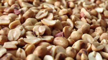 roasted peanuts, showing golden brown peanuts texture, close-up, delicious peanuts snack rich in protein and nutrition, perfect peanuts background