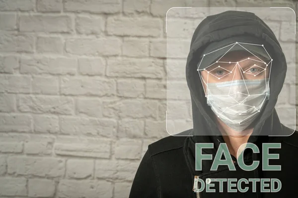 Scanning of Face of man in medical mask. Authentication by Face Detection recognition concept and Biometric. Security system.