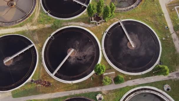 Aerial top view of round polls in wastewater treatment plant — стоковое видео