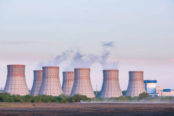 Nuclear power plant and cooling towers. Industrial zone with power plant generate nuclear power or electricity