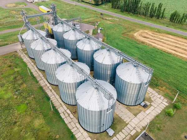 Grain elevator and agricultural storage. Containers silos storing agriculture crop in countryside.