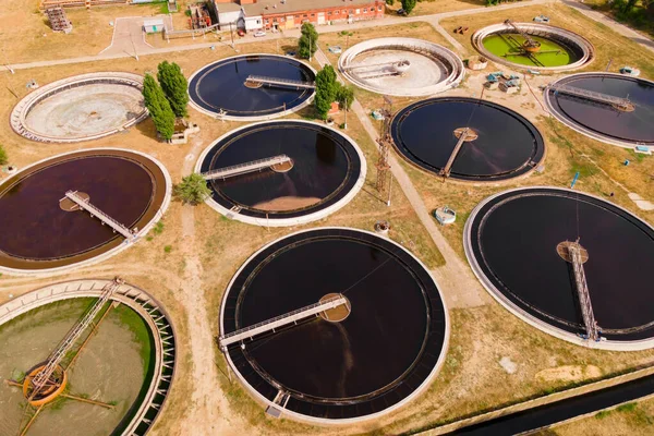 Sedimentation water basins at sewage treatment plant. Sewage treatment plant removes contaminated wastewater and turns it into environmentally safe clean water