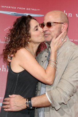 Melina Kanakaredes, John Varvatos