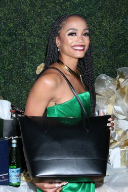 LOS ANGELES - JUN 13:  Rachel Lindsay with Kate Spade purse at the 48th Daytime Emmy Awards Gifting Photos - June 13 at the ATI Studios on June 13, 2021 in Burbank, CA clipart