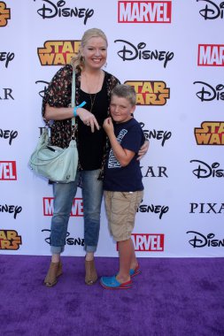 Melissa Peterman, Riley David Brady
