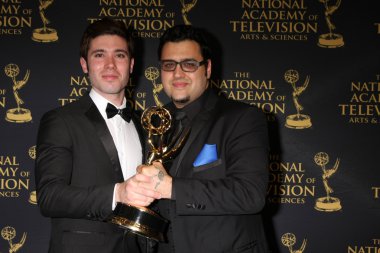 Kristos Andrews, Gregori J Martin