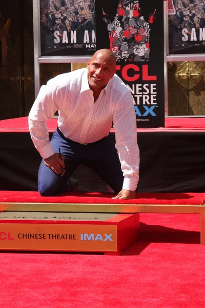 Dwayne “The Rock” Johnson with his cousin, who is also his stunt double