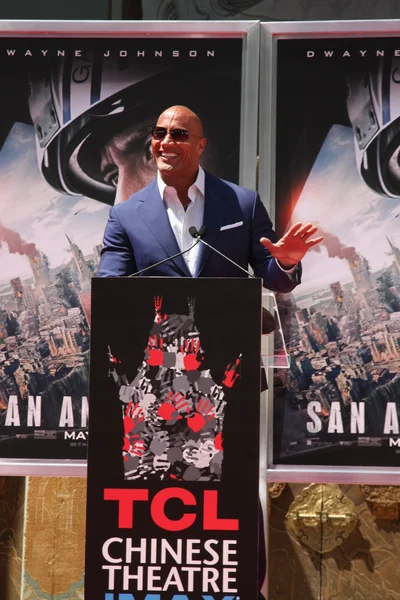 Dwayne “The Rock” Johnson with his cousin, who is also his stunt double