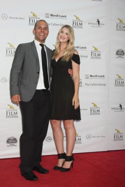 Jon Paul Rothie, Hillary Harpster