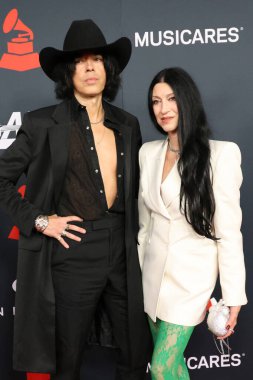 Lawrence Rothman, Floria Sigismond, 30 Ocak 2026 tarihinde Los Angeles, CA 'da Los Angeles Kongre Merkezi' nde yılın MusiCares etkinliği IHO Mariah Carey 'de.