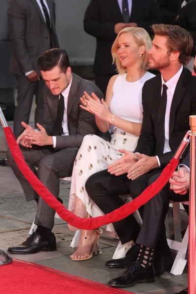 Josh Hutcherson, Jennifer Lawrence, Liam Hemsworth — Foto de Stock