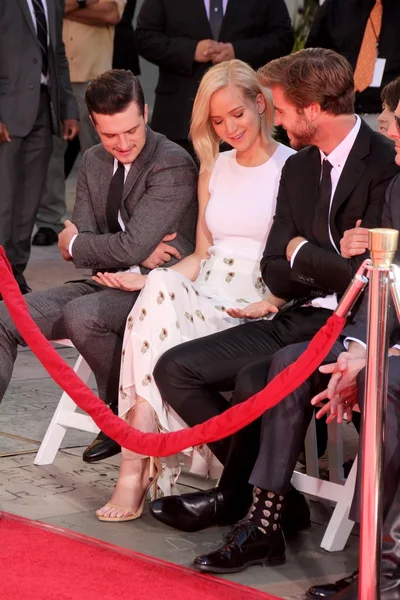 Josh Hutcherson, Jennifer Lawrence, Liam Hemsworth — Fotografie, imagine de stoc