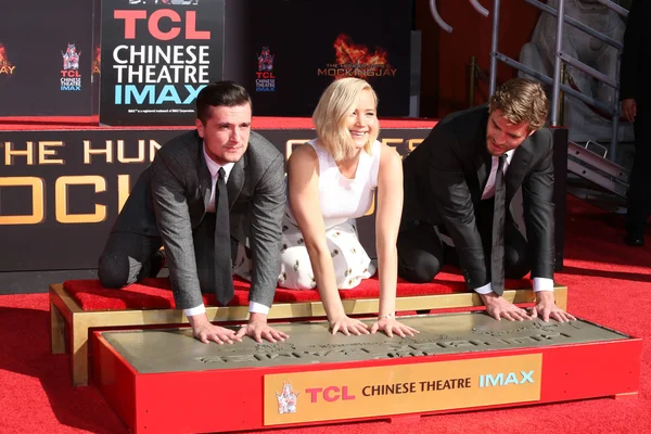 Josh Hutcherson, Jennifer Lawrence, Liam Hemsworth — Foto Stock