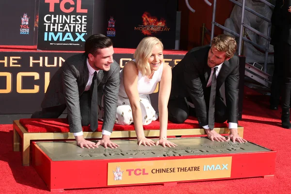 Josh Hutcherson, Jennifer Lawrence, Liam Hemsworth — Stockfoto