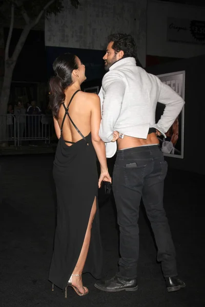 Emmanuelle Chriqui, Adrian Bellani — Stock Photo, Image