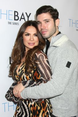 Lilly Melgar, Kristos Andrews