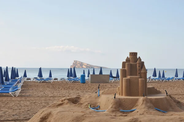ビーチで砂のお城 ストックフォト