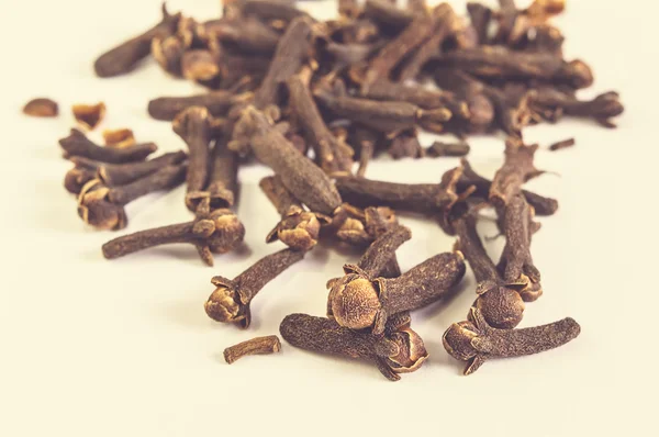 Cloves isolated on light background. — Stock Photo, Image