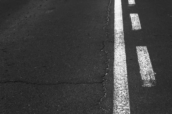 Double white line on asphalt road. Stock Photo